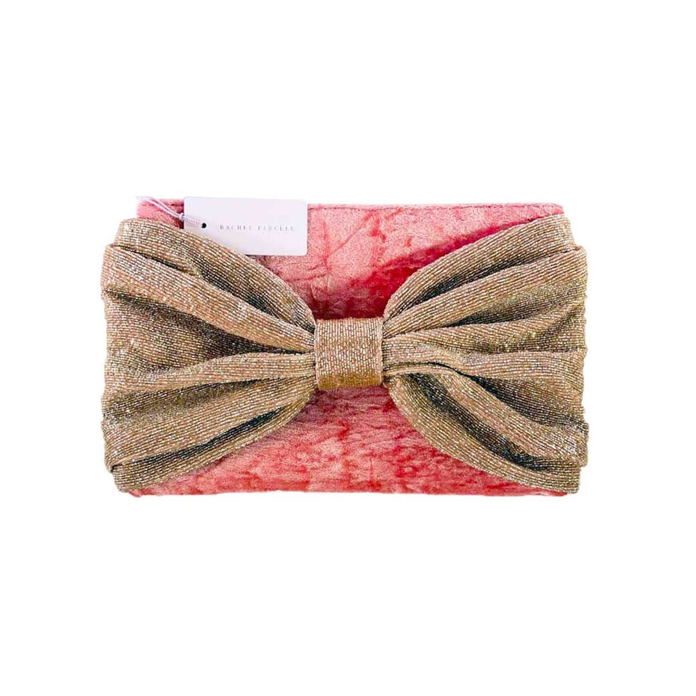 - Brand: Rachel Parcell
- Polyester interior
- About 10.5" W x 6.5" H x 0.5" D